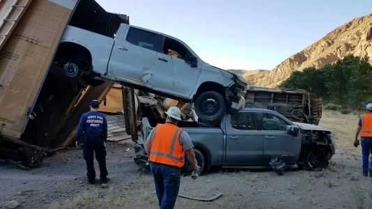 car-carrying-train-derailment.webp