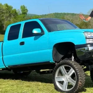 Whistlin Diesel squatted truck.webp
